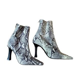L’Intervalle Dukette snake print boots